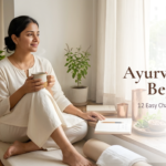 Woman sitting with herbal tea in a calm home setting, representing Ayurveda for beginners and simple daily health habits