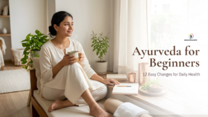 Woman sitting with herbal tea in a calm home setting, representing Ayurveda for beginners and simple daily health habits